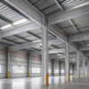 Sistema de aislamientos ignífugos instalado para protección pasiva contra incendios en estructura metálica industrial.
